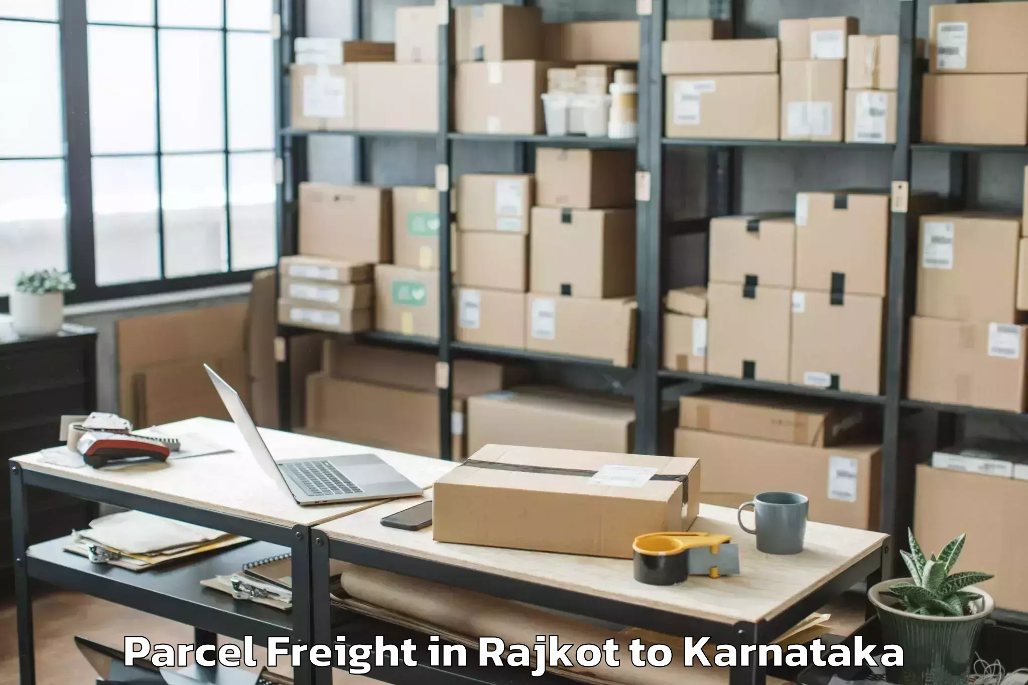 Affordable Rajkot to Mannaekhelli Parcel Freight